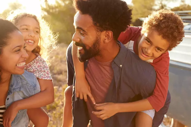 happy and healthy family outside